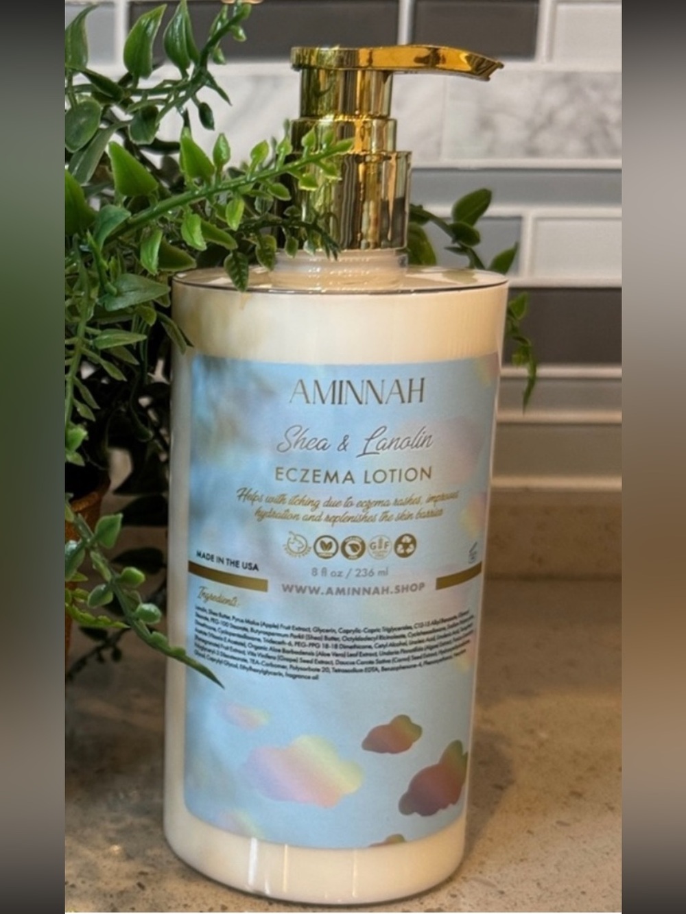 AMINNAH Shea & Lanolin Eczema Lotion. It comes in an 8 fl oz NWT
